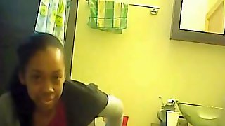 Black girl pissing on toilet has the extra thick pussy hair