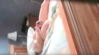 Spy cam sex video with doll dildo fucking nub on the bed