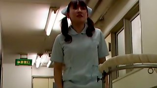 Nurse with medical stuff in hands gets skirt pulled up