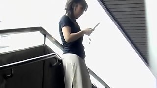 Asian milf almost lost her panties after skirt sharking