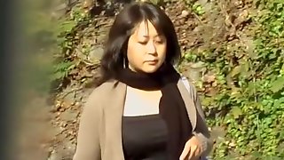 Plump Japanese MILF recorded with no panties during sharking