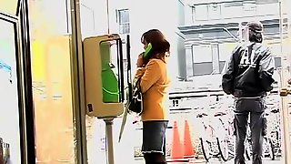 Pay phone sharking action with glamorous Japanese girl being really surprised