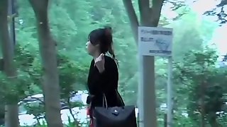 Slim Japanese sweetie flashes her naked butt when someone snatches her skirt