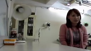Pervy Japanese gyno loves squeezing his patient.s boobies