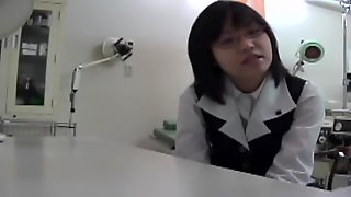 Nerdy Japanese teen got her cunt examined by a naughty gyno