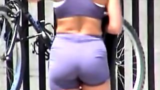 Fat ass voyeured on cam in the latex swimsuit shorts 07b