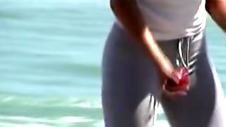 Long haired cutie with big candid ass spied on the beach 01zr