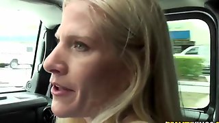 Mature blondie sucks throbbing penis in a car