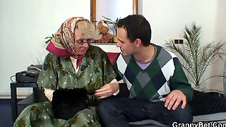 Lonely granny is pleasing an young stud