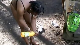 Hot Ebony Woman takes a bath in the woods