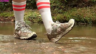 Caroline New Balance sneaker hike with mud and water preview