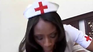 Sexy Ebony Nurse helps a white Patient