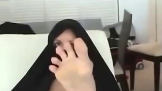 Horny chick in hijab knows how to give a good footjob