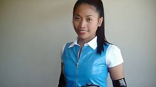 Asian in blue PVC skirt and top