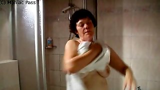 Grandma dildoing after a shower