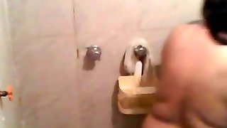 Asian voyeur video with a sexy slut under shower