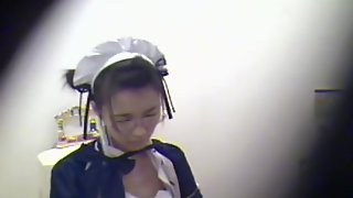 Kinky Asian maid spotted on a hidden camera fingering her twat