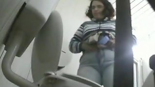 Chick got her butt recorded on a spying camera in a toilet
