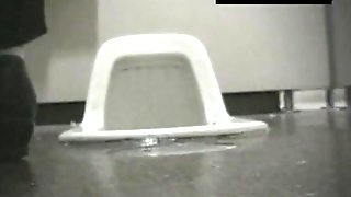 Public bathroom with a hidden camera exposing pussies wizzing