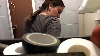 Unsuspecting lady sitting on toilet spied by hidden camera