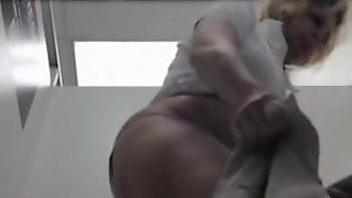 Granny with massive ass changing pants in the dressing room