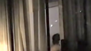Neighbor spies an awesome lady through the window