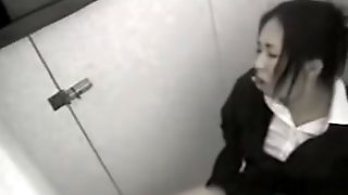 Kinky girl from Japan masturbates in the toilet with no shame