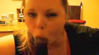 Amateur girlfriend sucked black cock while talking on the phone