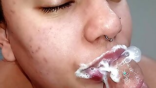 Dancing madly on the cock with her mouth and her naughty tongue, making the pervert cum a lot