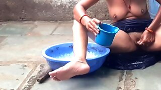 Sister-in-law gets naked in the outdoor bathroom for a steamy shower