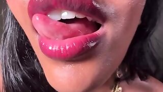 Indian vixen showing off soft wet lips and probing tongue