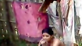 Topless Indian wife washes herself