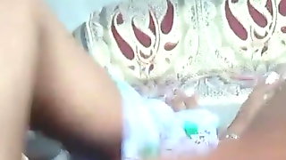 Indian guy fingering his wife then fucking on couch