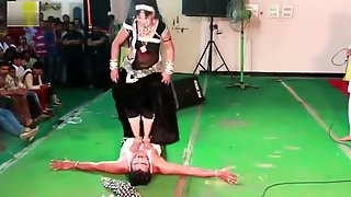 Indian Lady Trampling Man in Dance in Public