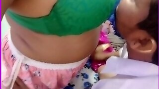 Desi girl opens her green bra and grabs boyfriend's cock.