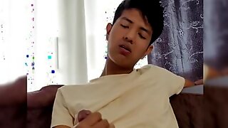 Young Indian masturbating on the couch