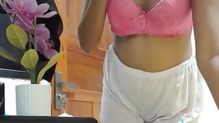 Cute indian girl changing clothes and fifingerings at home alone