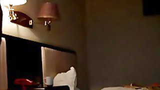 Chinese non-professional couple in hotel