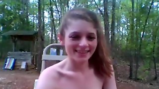 Redneck hottie flashes her tits outside, while playing a sex game online.