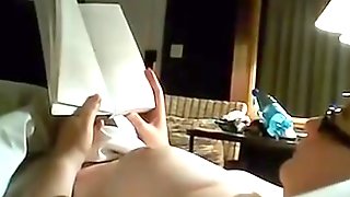 Beth reading in bed topless - enjoy her curves