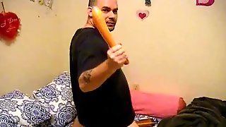 Sitting on a big carrot stroking my cock to acheive orgasm and drink my cum