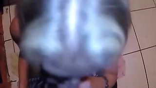 Cumming on the wifes face in the gloryhole. she jerks off a black guy afterwards !!!