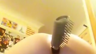 Kinky selfie. hairbrush in her ass and milfs sextoy in her pussy.