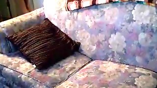 Home alone ebony girl sneakily masturbates with a vibrator on the sofa