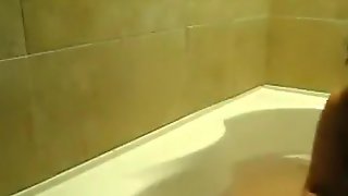 White girl has oral and doggystyle sex with her black bf in the bathtub