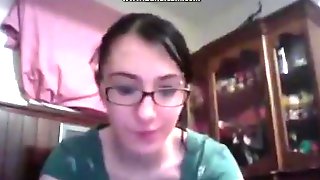 Nerdy girl with glasses masturbates with a toy for her bf on skype