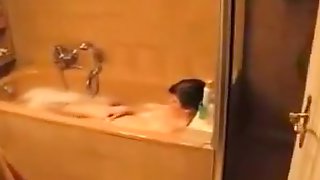 Girl taking a bath gets disturbed by her bf for a blowjob