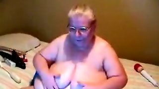 Obese granny plays with her tits and cunt in webcam solo