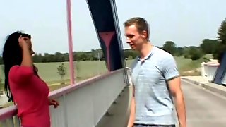 Busty German Milf sucks and fucks outdoor on a bridge