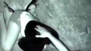 Voyeur tapes a partygirl sucking and riding a guys cock at the beach at night